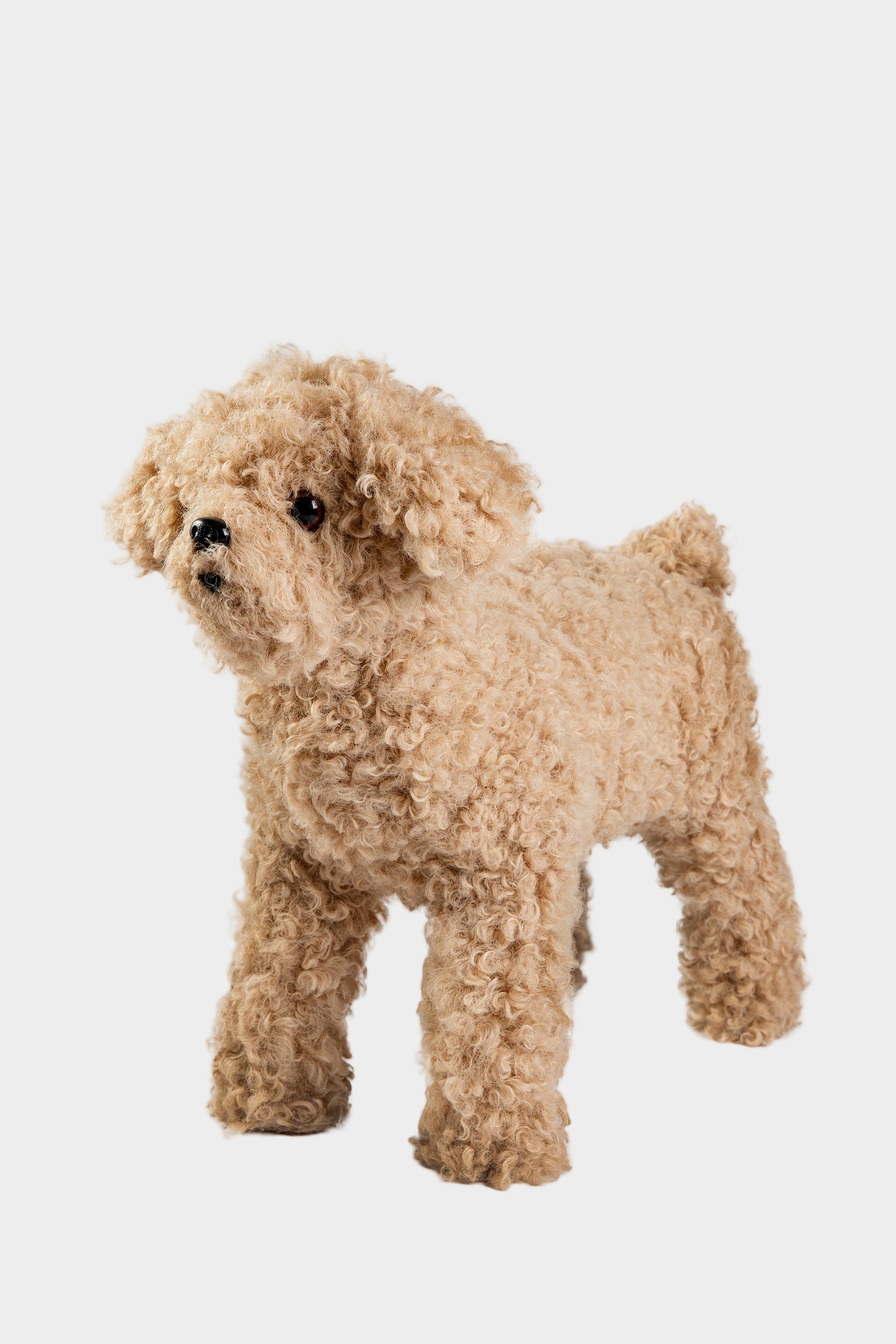 Side view of beige dog stress relief accessory